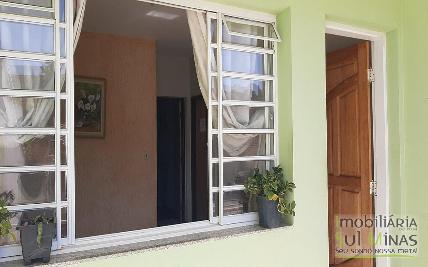 Casa com 4 Dormitórios a Venda no Centro de Cambuí MG Cód. 1505 (13)