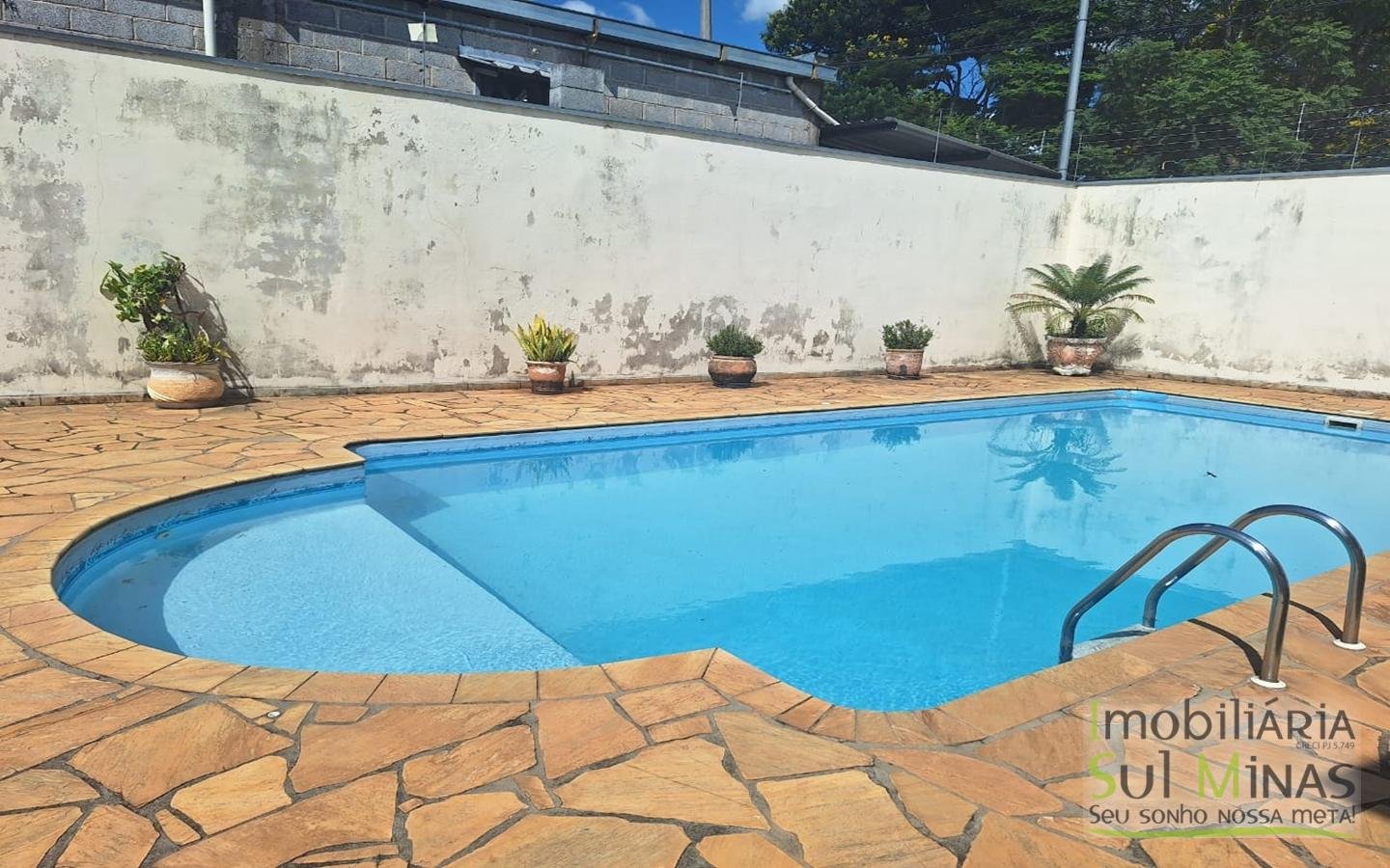 Casa com Piscina a venda Próxima ao Centro Cambuí MG Cod. 1949 (14)