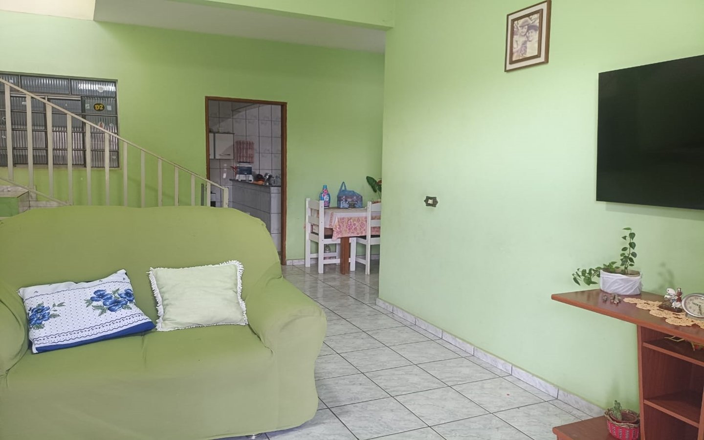 Casa de esquina com 2 garagens independentes e 300m² de construção a venda em Cambui MG